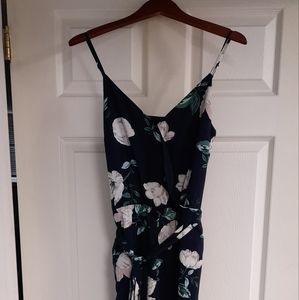 Wide leg pant jumpsuit with crossover top (button closure) and waist tie